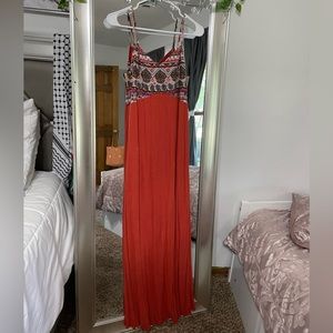 orange long dress with design at the top